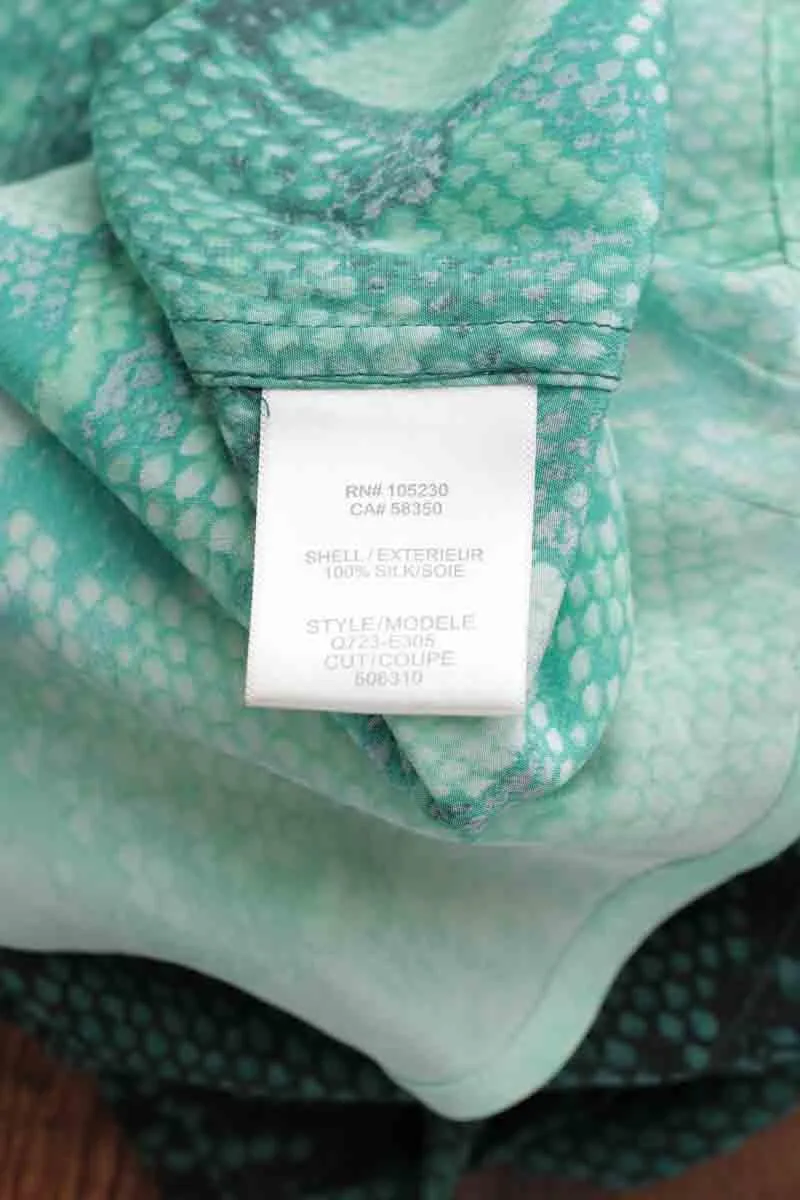Blouse en soie  Equipment vert. Matière principale soie. Taille 36