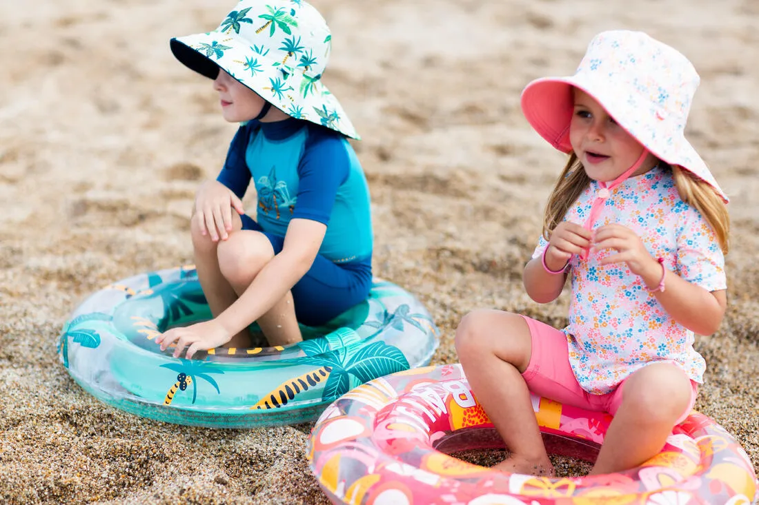 Chapeau anti uv bébé réversible rose clair et imprimé fleurs