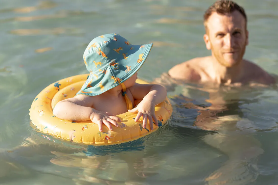 Chapeau anti uv bébé réversible rose clair et imprimé fleurs