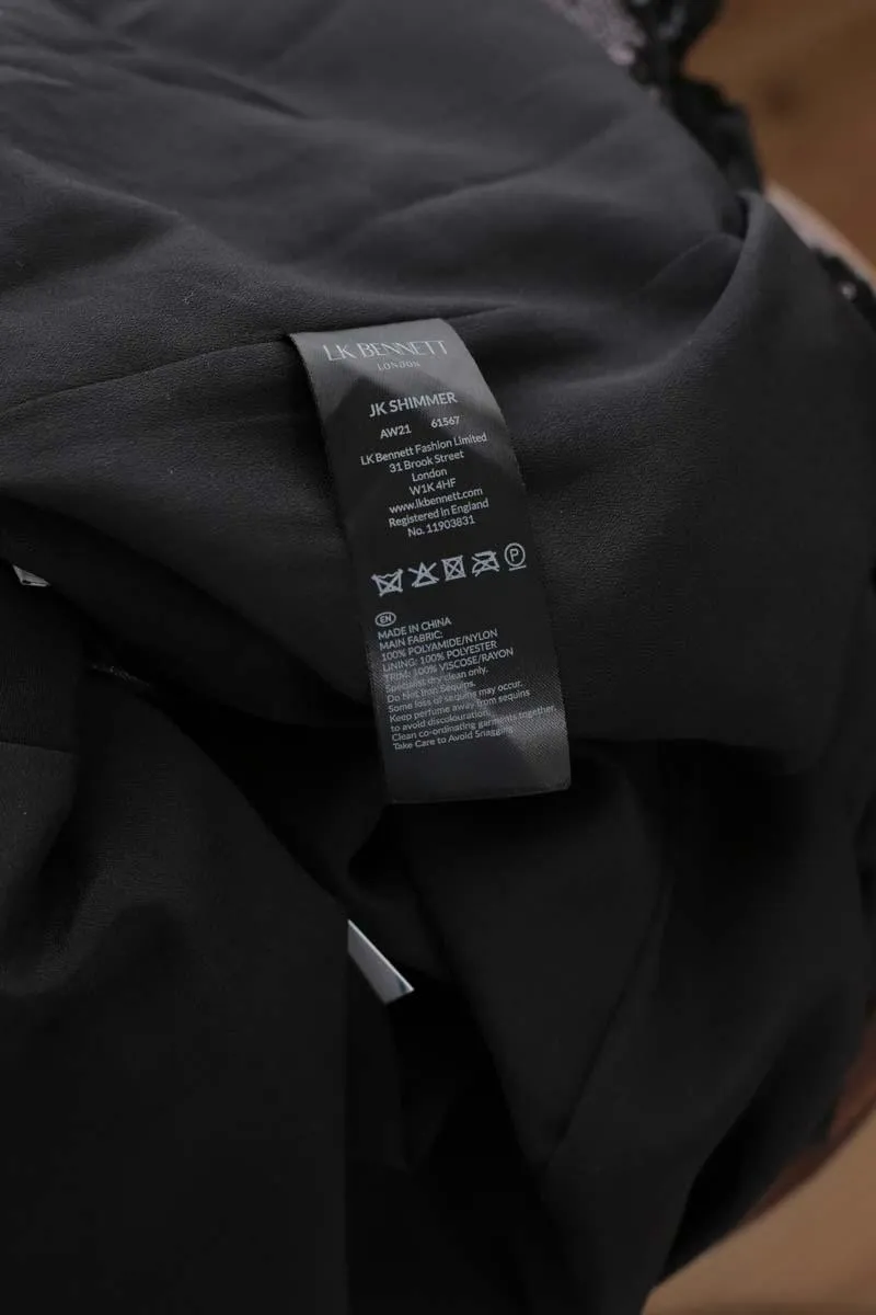 Veste noir  LK Bennett noir. Matière principale paillettes. Taille 42.